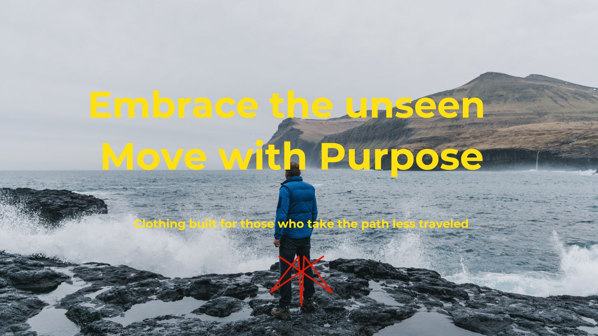 Man standing on rocky coastline, embracing the unseen with purposeful stance